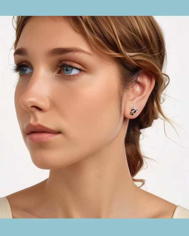 Portrait of young woman wearng SnoutGlam™ Frenchie Silver Earrings
